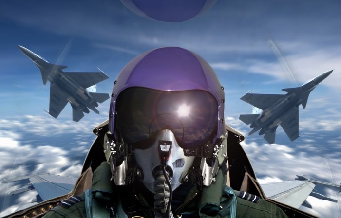 Pilot of a F16 jet in the sky.
