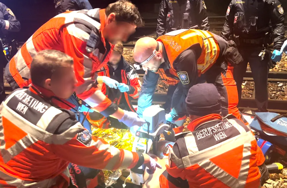 Team of EMS Vienna paramedics during trauma resuscitation.